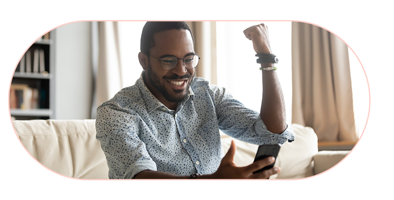 Benefits of recipients with man cheering, holding phone feature image